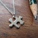 Miniature Puzzle Piece Silver Pendant Necklace