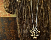 mushroom charm necklace in sterling silver and bronze