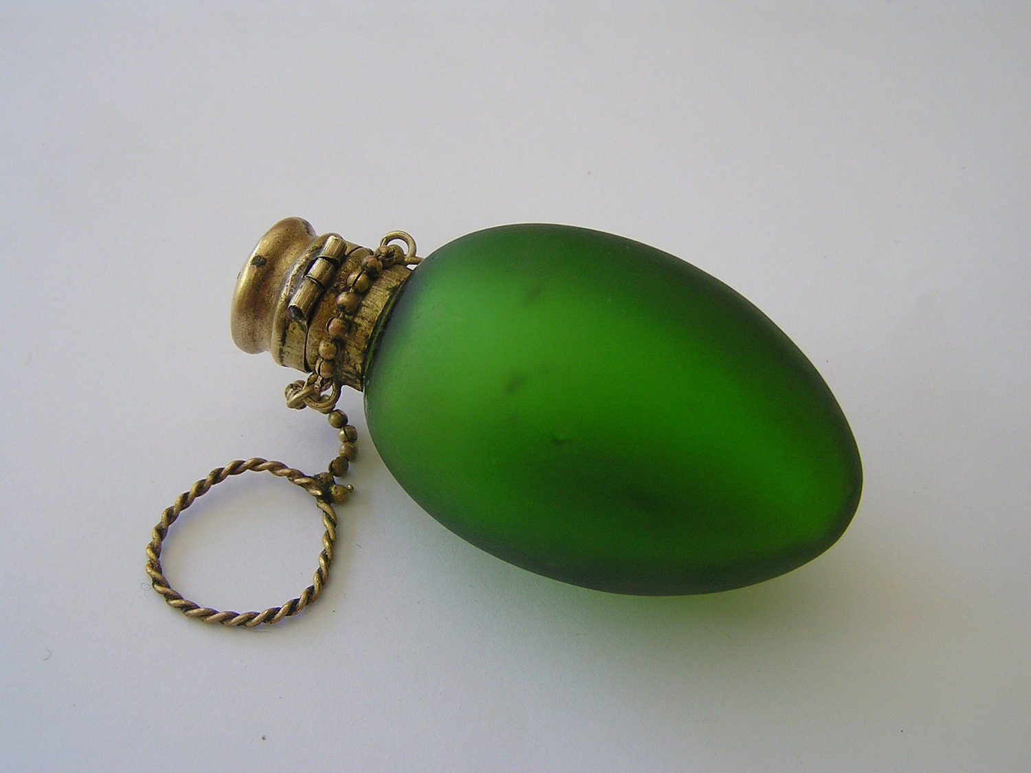 green perfume bottle