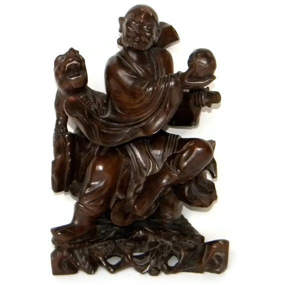 Antique chinese wood wooden carving carved figure statue of man or scholar with foo dog with glass eyes