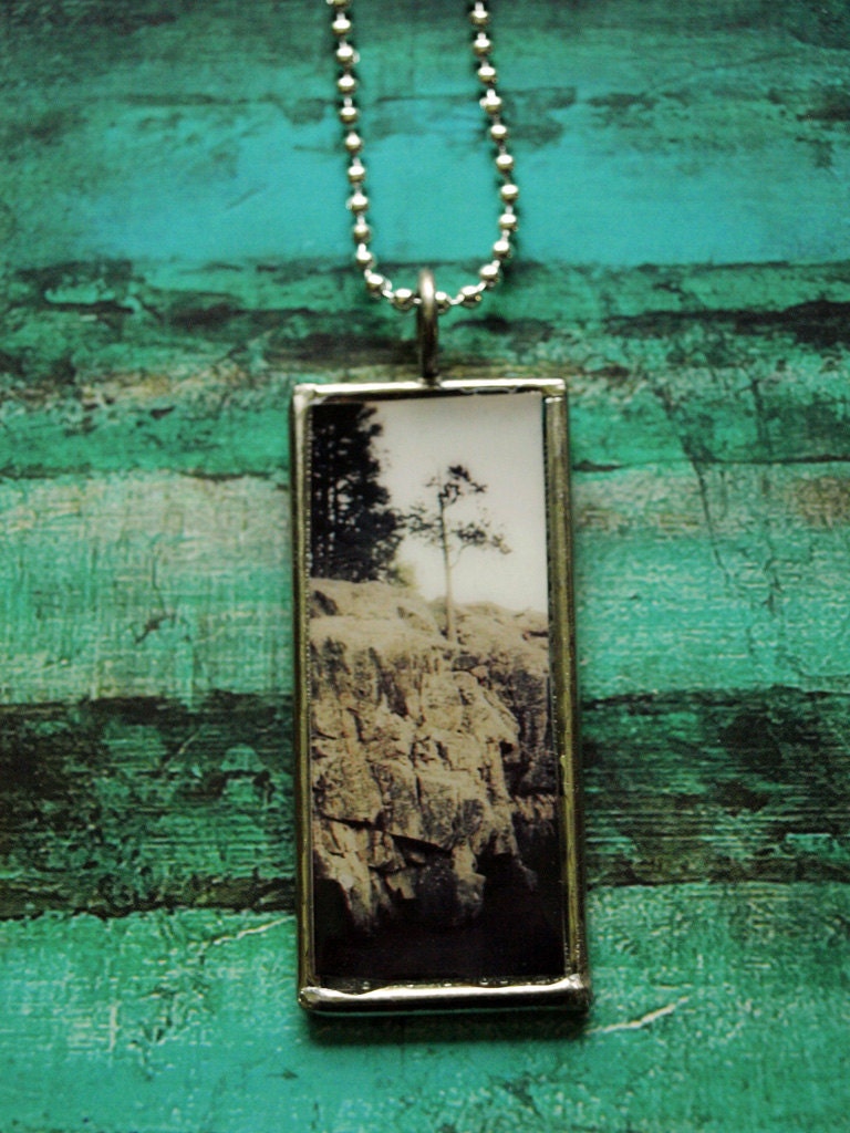 Overlook tree and rock pendant on framed glass- Music on reverse