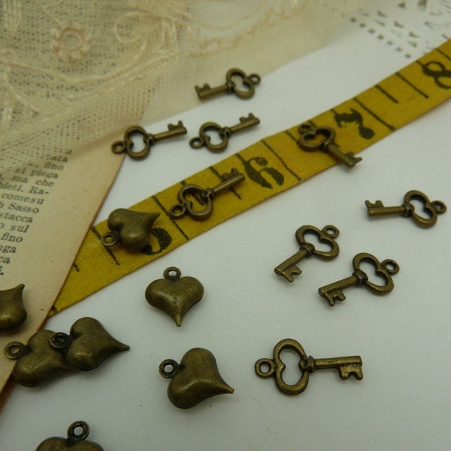 10 tiny hearts  10 tiny keys in aged brass