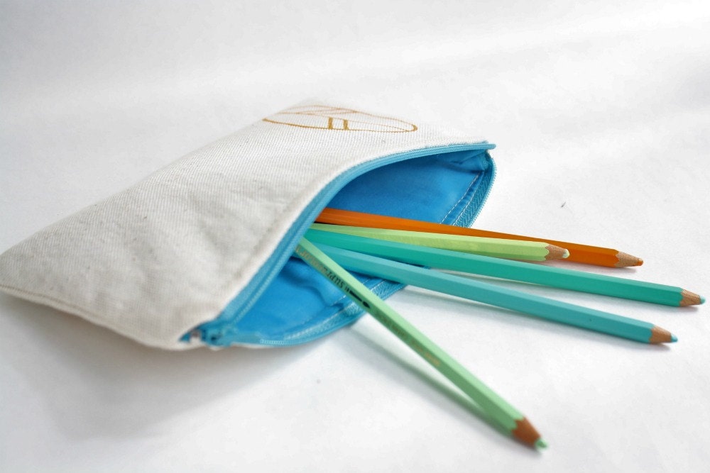 Spring pencil pouch screen printed in orange and turquoise