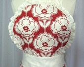 Full Apron with Ruffles and Cream Flowers in a Red Background