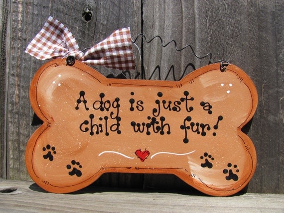A dog is just a child with fur cute wooden sign