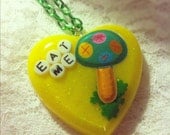 Eat Me Yellow Magic Mushroom Resin Heart Necklace