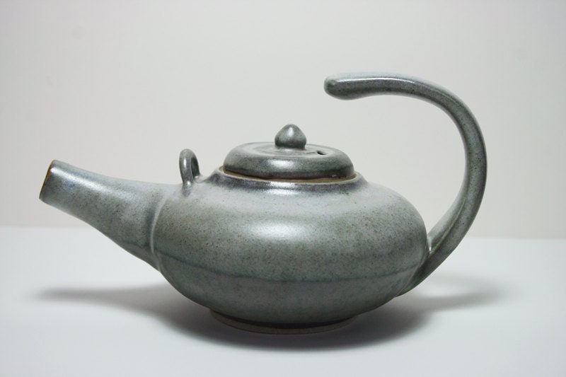 Floating handle teapot in two tone green