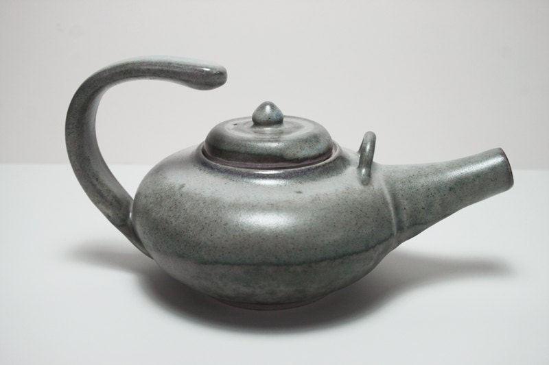 Floating handle teapot in two tone green