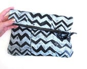 Large black and white hand-printed leather zig zags clutch
