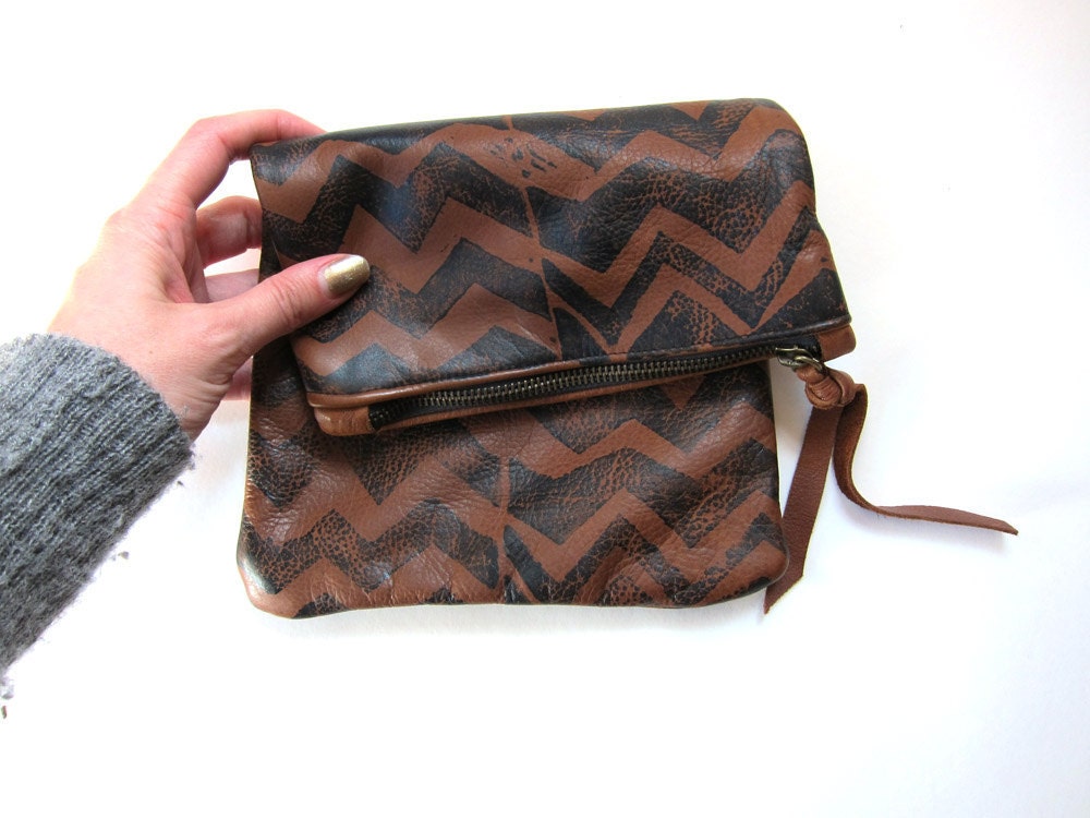 Medium brown and black hand-printed leather zig zags fold-over clutch