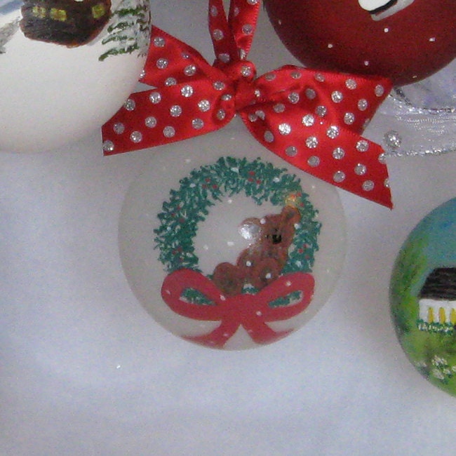 Hand painted bear and Christmas wreath ornament with personalization available.