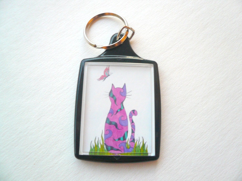 Art key chain, cat art, photo keychain Purple and green cat in the grass