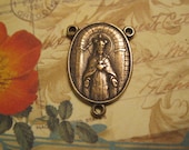 The Crowned Sacred Heart of Mary    Bronze Rosary Center