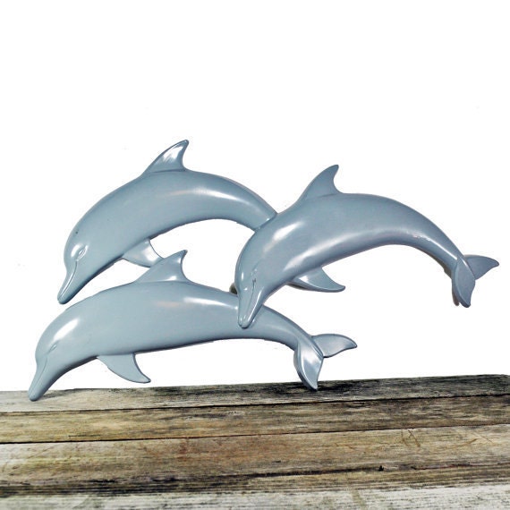 Fiberglass Syroco dolphins swimming wall art