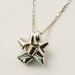 18 k starred node necklace