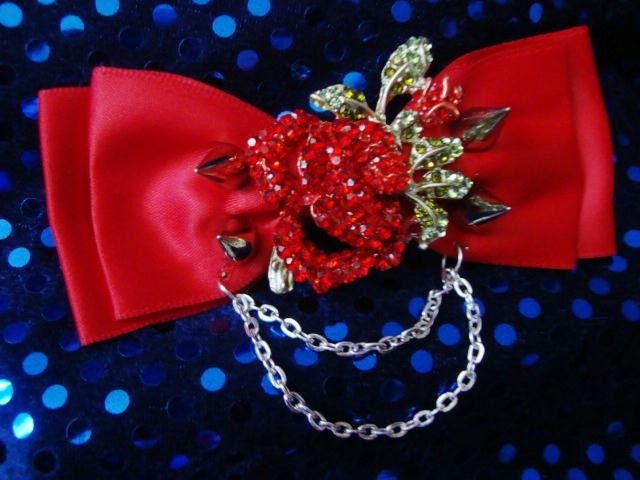 Swarovski red rose bow with spikes and chains