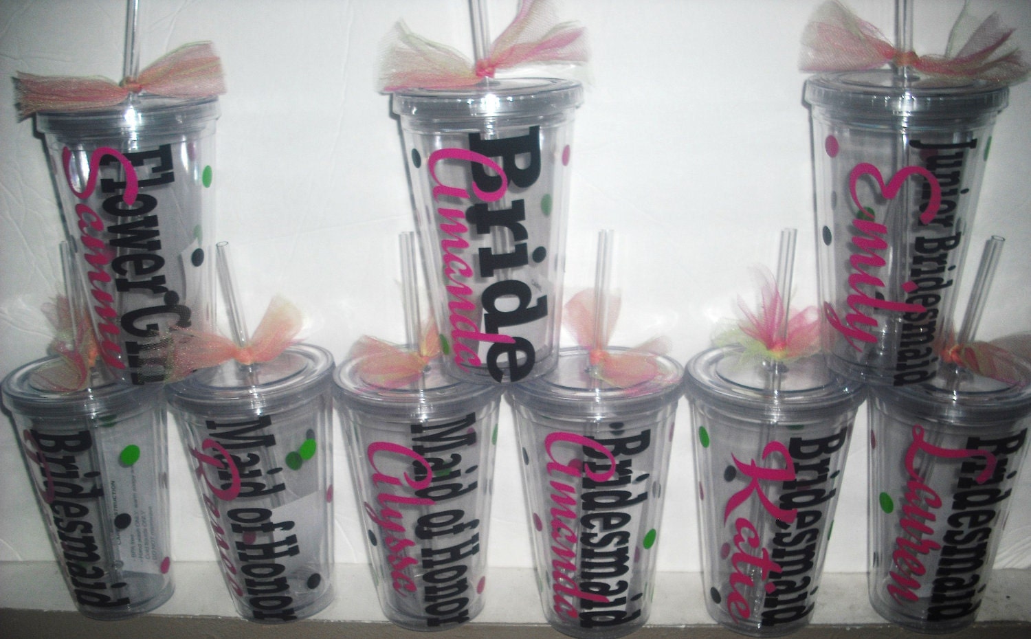 Set of 9 personalized acrylic cups with lids and straws. Great for wedding parties.