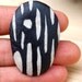Ceramic ring, organic lines