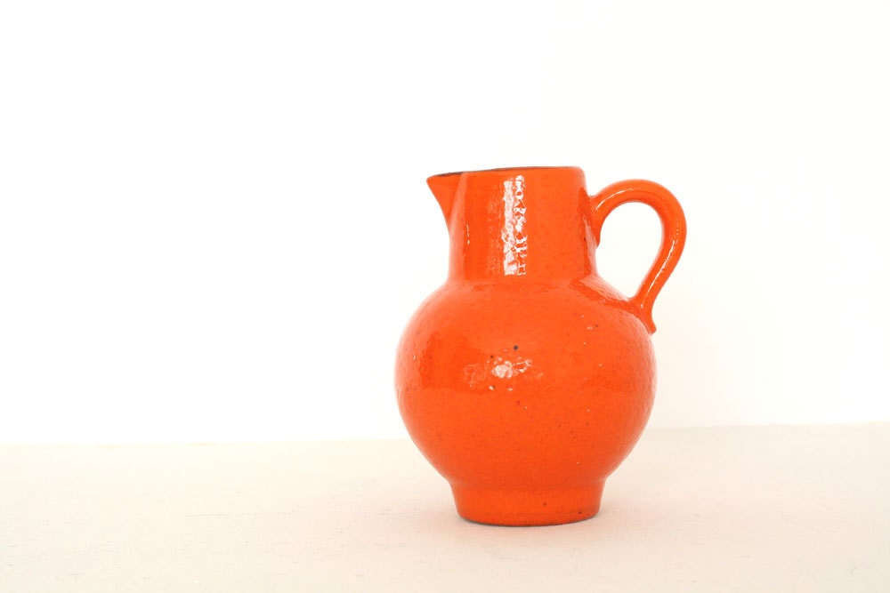 Vintage ceramic orange pitcher