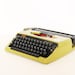 Vintage manual green deluxe typewriter