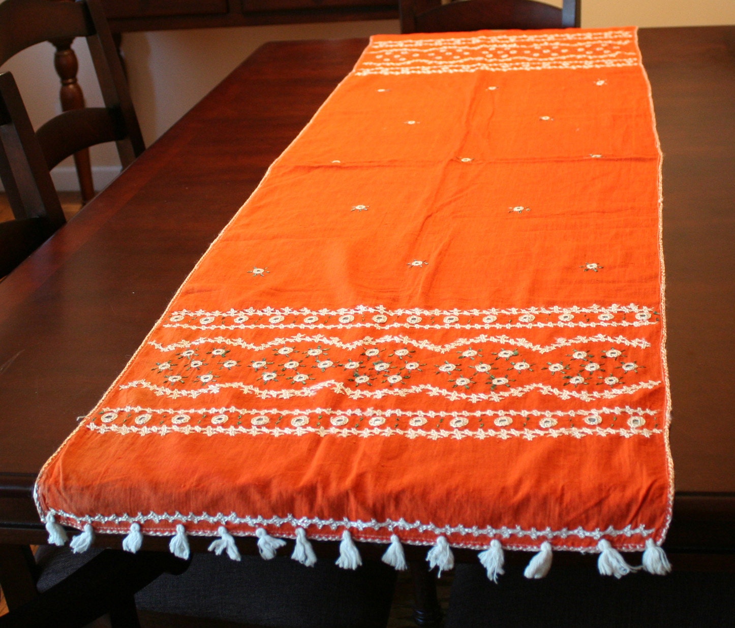 Orange vintage Indian table runner with mirrors