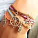 Multilayer colorful world bracelet with anchor ruddr owl hand cross pendant &colorful rope chain