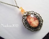Vintage / Steampunk Style Alphonse Mucha cameo necklace with carnelian