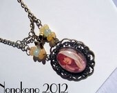 Vintage / Steampunk Style Alphonse Mucha cameo necklace with bow