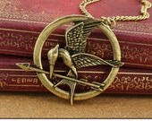 The hunger games, laugh at the bird pendant necklace, bronze color double sided three dimensional