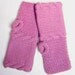 Lilac fingerless gloves.