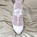White crochet  barefoot sandals.