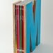M is for magazine. In turquoise.