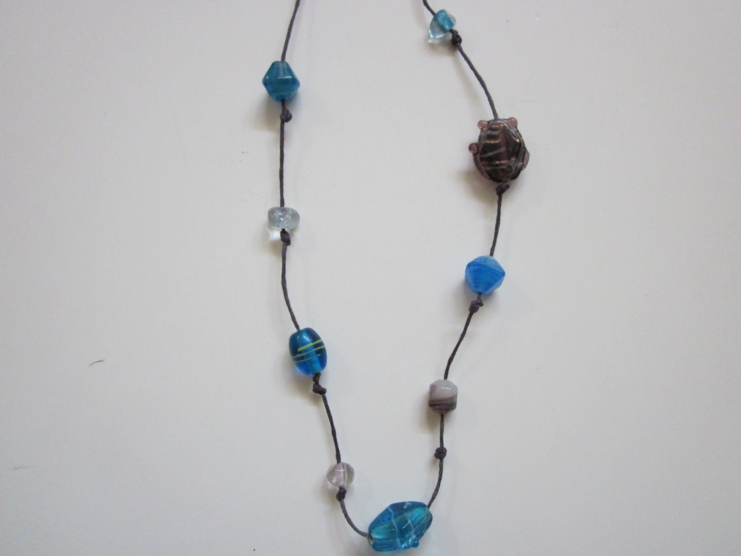 Discounted-Glass-Beaded Necklace on Purple Cord