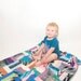 Psychedelic Patch Work Crib Quilt Made from Thief&Bandit Hand Printed Organic Jersey Scraps