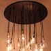 The Neely Round Industrial Chandelier with vintage bulbs