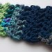 Unique Crochet Cuff: completely OOAK crocheted cuff in blue and green yarns, with blue / green flower button.