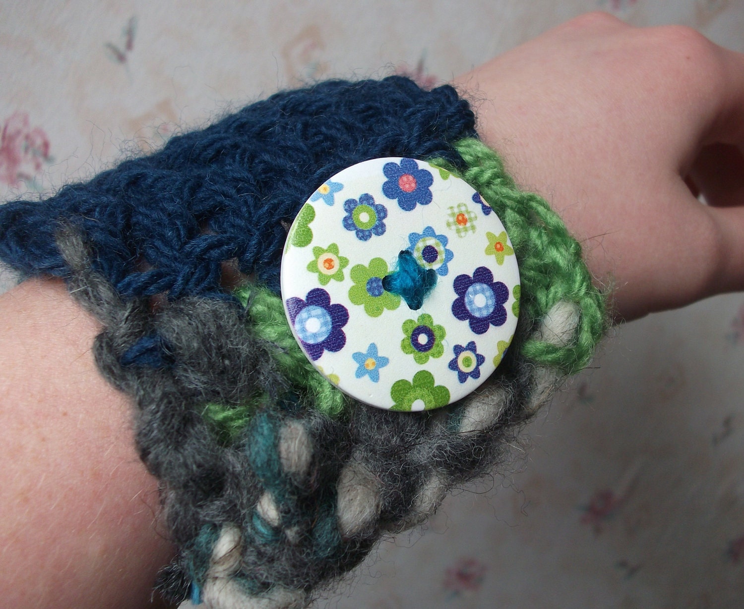 Unique Crochet Cuff: completely OOAK crocheted cuff in blue and green yarns, with blue / green flower button.