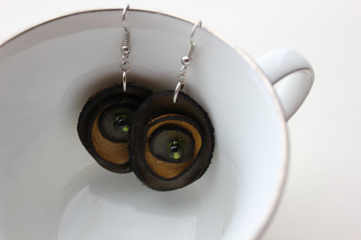 Layered leather rosette flower earrings with glass bead detail