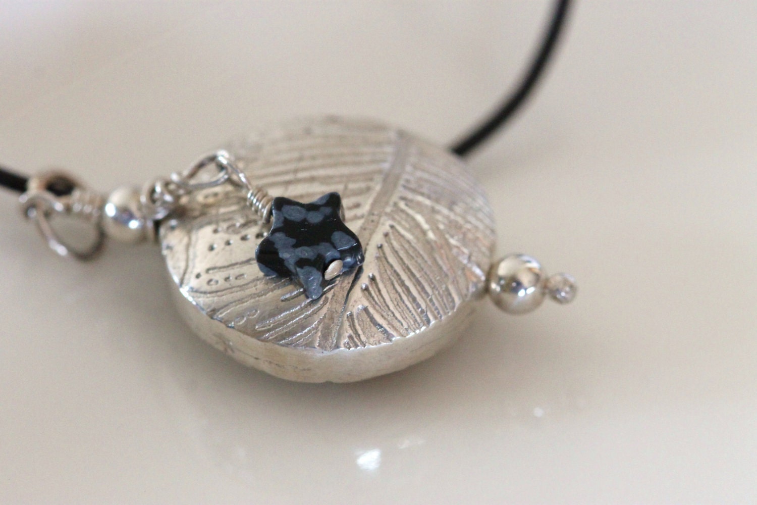 handmade fine silver pendant /necklace / feather pattern / metalwork jewelry by girlthree
