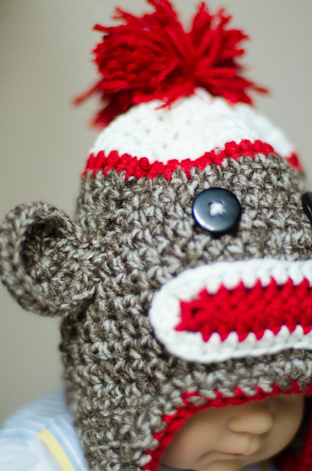 Sock monkey earflap hat