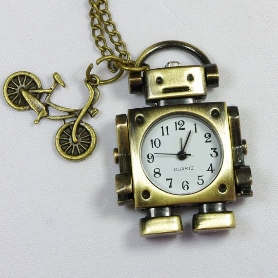 robot pocket watch necklace with a little bike