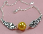 Golden Snitch Bracelet ----harry potter Enchanted Steampunk Golden snitch with Double Sided wings