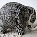 Lucky Elephant Bank -- White Ceramic Elephant with Black Embossed design on top.