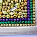 Framed Mardi Gras bead mosaic Fleur De Lis purple, green, gold, shabby chic frame