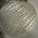 Pair of vintage 70's brass and glass swag hanging globe light fixtures