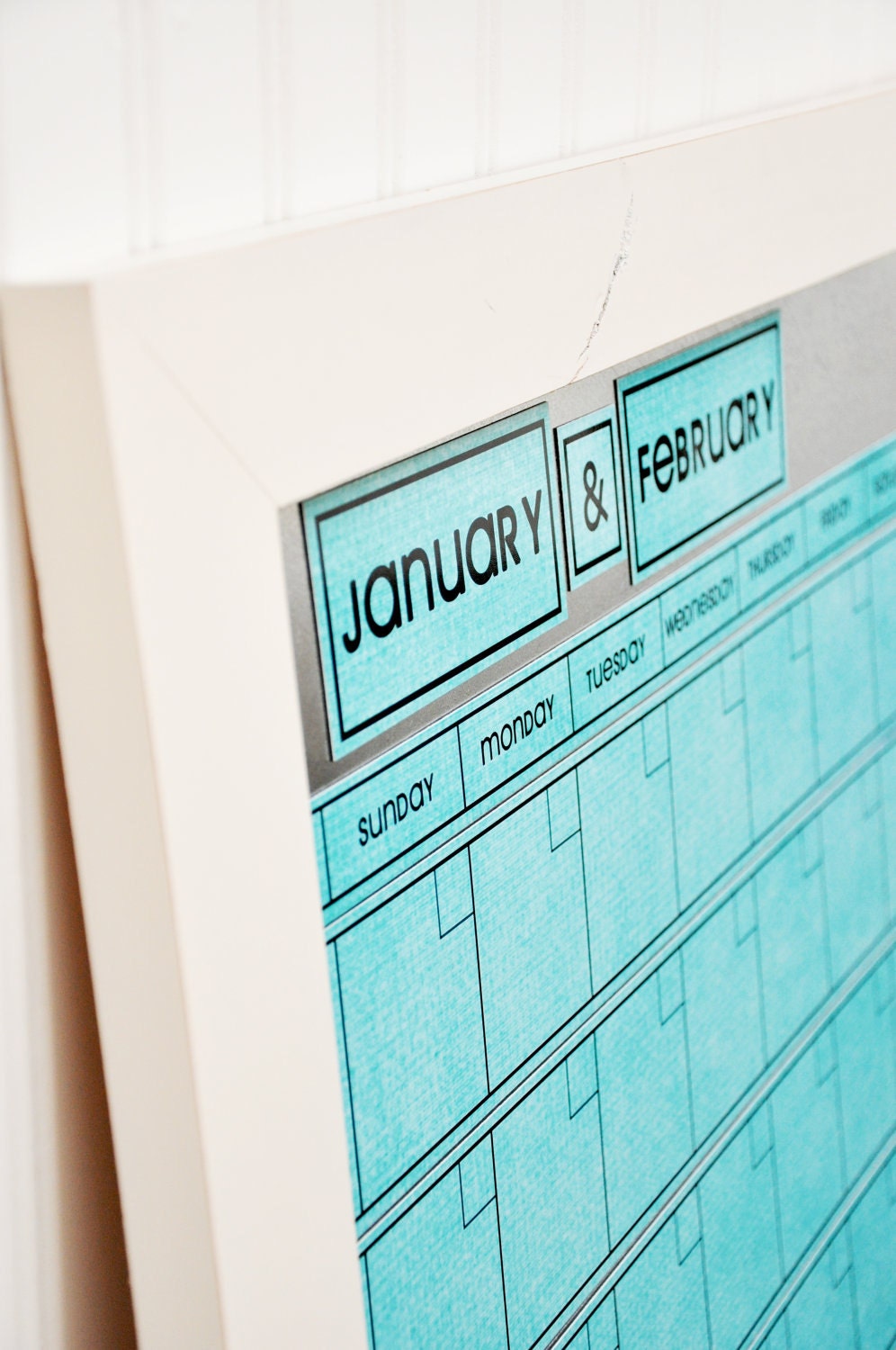 Large Magnetic Dry/Wet Erase Calendar with 6 weeks Showing at All Times. Aqua with White Frame.