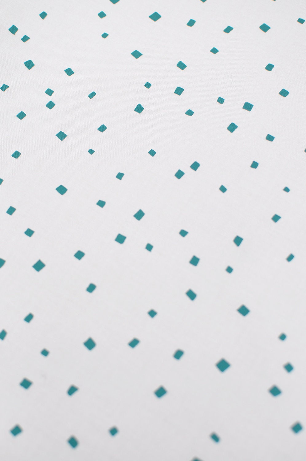 confetti in peacock blue green on bone handprinted fabric panel