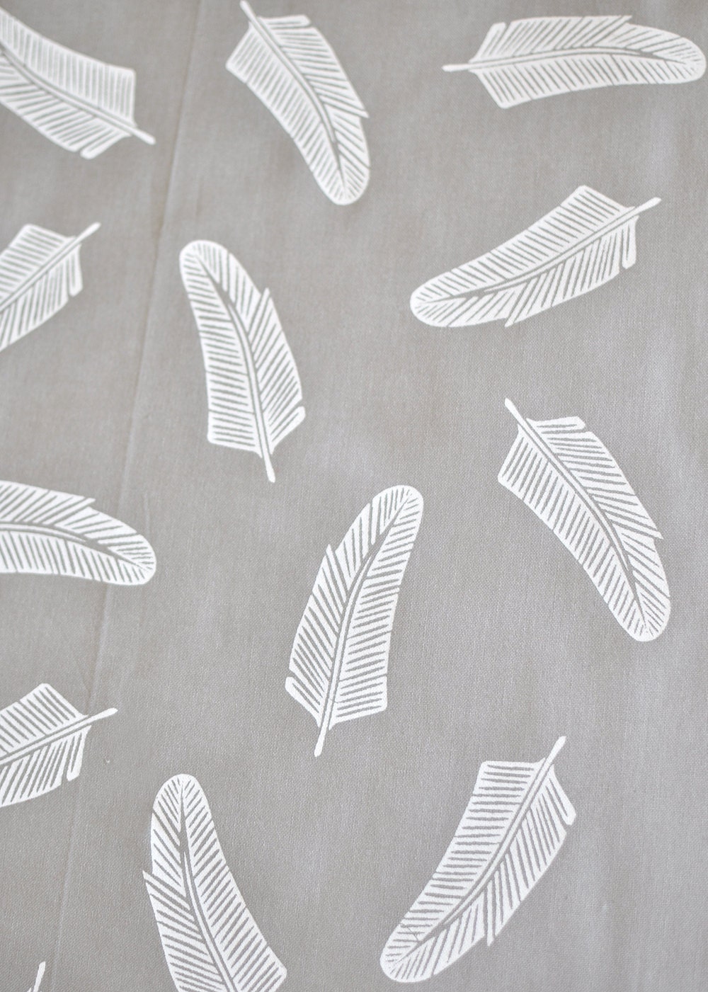 quill in alabaster on grey cotton handprinted fabric panel
