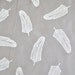 quill in alabaster on grey cotton handprinted fabric panel