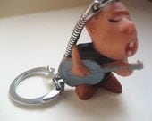 Vintage Guitar Player with Blue Guitar Keychain
